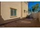 Backyard with gravel landscaping and partial view of AC unit at 1367 S Country Club Dr # 1276, Mesa, AZ 85210