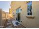 Backyard features gravel landscaping and sliding glass doors to the home's interior at 1367 S Country Club Dr # 1276, Mesa, AZ 85210