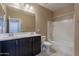 Bathroom features a double sink vanity and a shower over tub at 1367 S Country Club Dr # 1276, Mesa, AZ 85210