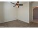 This bedroom features neutral walls, ceiling fan, and carpet flooring at 1367 S Country Club Dr # 1276, Mesa, AZ 85210