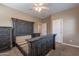 Primary bedroom with furniture, ceiling fan, and two doors at 1367 S Country Club Dr # 1276, Mesa, AZ 85210