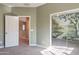 Cozy bedroom features a closet with a mural, soft carpet and views of the upstairs hallway at 1367 S Country Club Dr # 1276, Mesa, AZ 85210