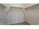 Walk-in closet features shelving and railing at 1367 S Country Club Dr # 1276, Mesa, AZ 85210