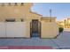 Well-maintained exterior with secure gated entry and desert landscaping at 1367 S Country Club Dr # 1276, Mesa, AZ 85210