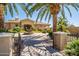 Stunning single Gathering home featuring a circular driveway and stone fountain at 1367 S Country Club Dr # 1276, Mesa, AZ 85210