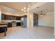 Bright kitchen with stainless steel appliances, granite counters, and a seamless transition to the living area at 1367 S Country Club Dr # 1276, Mesa, AZ 85210