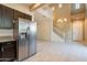 Modern kitchen features stainless steel appliances and granite countertops, seamlessly flowing into a spacious living area at 1367 S Country Club Dr # 1276, Mesa, AZ 85210