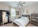 Charming bedroom with rustic wood furnishings and a comfortable queen-size bed at 13941 W Tierra Grande --, Surprise, AZ 85387