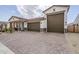 Charming home with a large driveway and three-car garage, perfect for a growing Gathering at 13941 W Tierra Grande --, Surprise, AZ 85387