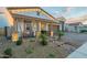 Charming single-Gathering home featuring a welcoming front porch and desert landscaping at 13941 W Tierra Grande --, Surprise, AZ 85387