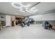 Spacious three-car garage with epoxy flooring and custom lighting at 13941 W Tierra Grande --, Surprise, AZ 85387