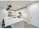 Bright kitchen with white cabinetry, modern appliances, and a large central island at 13941 W Tierra Grande --, Surprise, AZ 85387