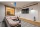 Comfortable covered outdoor living area with a ceiling fan and a TV at 13941 W Tierra Grande --, Surprise, AZ 85387
