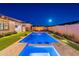 Stunning pool with built in barstools, LED lighting, and plenty of space for relaxation at 13941 W Tierra Grande --, Surprise, AZ 85387