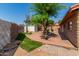 Large backyard featuring a wood deck, shed, lawn, and mature shade tree at 1448 E Royal Palm Rd, Phoenix, AZ 85020