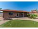Charming backyard featuring a putting green, fire pit, and landscaped garden, perfect for outdoor relaxation at 1448 E Royal Palm Rd, Phoenix, AZ 85020