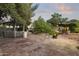 Charming backyard with tile patio, gazebo, and fire pit, perfect for outdoor entertaining at 1522 W Myrtle Ave, Phoenix, AZ 85021