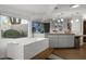 Bright bathroom with large soaking tub and garden views provides a spa-like experience at 1522 W Myrtle Ave, Phoenix, AZ 85021