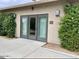 Building entrance with double doors and professional landscaping at 1522 W Myrtle Ave, Phoenix, AZ 85021
