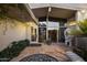 Inviting front entrance featuring terra cotta tile and modern architectural details and desert landscaping at 1522 W Myrtle Ave, Phoenix, AZ 85021