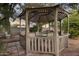 Outdoor gazebo sitting area features table and chairs, providing a relaxing backyard space at 1522 W Myrtle Ave, Phoenix, AZ 85021