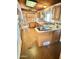 Kitchen featuring wood cabinets and island at 1522 W Myrtle Ave, Phoenix, AZ 85021