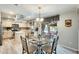 Bright kitchen and breakfast nook featuring stainless steel appliances and a view of the back yard at 15962 W Statler St, Surprise, AZ 85374