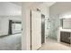 Modern primary bathroom features a glass shower and vanity at 17514 N Rainbow Cir, Surprise, AZ 85374