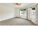 Bright bedroom with large window and carpet at 17514 N Rainbow Cir, Surprise, AZ 85374