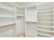 Walk-in closet with custom shelving offering ample storage space at 17514 N Rainbow Cir, Surprise, AZ 85374