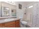 Bright bathroom features neutral sink, toilet and full bath with shower at 1758 E Birch St, Casa Grande, AZ 85122