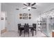 Cozy dining area with gray table, four chairs, and decorative wall art at 1758 E Birch St, Casa Grande, AZ 85122