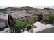 Beautiful single-story home with desert landscaping and a view of the lake at 18233 W Hope Dr, Goodyear, AZ 85338