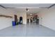 Spacious garage with epoxy flooring, ample storage space, and good lighting at 18233 W Hope Dr, Goodyear, AZ 85338