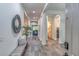 Spacious foyer with stylish decor and ample natural light streaming through the open floorplan at 18233 W Hope Dr, Goodyear, AZ 85338
