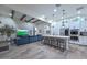 Open-concept design with a seamless flow from the living room to the kitchen, perfect for modern living and entertaining at 18233 W Hope Dr, Goodyear, AZ 85338