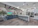 Spacious living area featuring a gourmet kitchen, large island, and comfortable seating at 18233 W Hope Dr, Goodyear, AZ 85338
