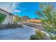 Beautiful street view with desert landscaping, sidewalks and a mountain in the background at 18233 W Hope Dr, Goodyear, AZ 85338