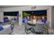 Inviting patio with fire pit, outdoor seating, and views of the desert landscape at 18233 W Hope Dr, Goodyear, AZ 85338