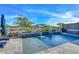 Gorgeous outdoor pool and spa area with water features and tranquil views of the surrounding landscape at 18233 W Hope Dr, Goodyear, AZ 85338