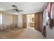 The bedroom features wood paneling and access to a full bathroom at 1939 E Libby St, Phoenix, AZ 85022