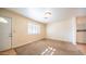 Bedroom featuring neutral paint, carpeted floors, natural light, and a white door at 2002 S Apache Dr, Apache Junction, AZ 85120