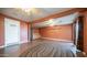 Open bonus room with concrete floors and orange walls at 2002 S Apache Dr, Apache Junction, AZ 85120