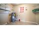 Water heater and shelving in a utility room at 2002 S Apache Dr, Apache Junction, AZ 85120