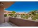 Balcony view overlooking the community pool and surrounding landscaped grounds at 20660 N 40Th St # 1112, Phoenix, AZ 85050