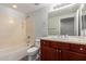 Bathroom with a vanity, toilet, and shower-tub combo at 20660 N 40Th St # 1112, Phoenix, AZ 85050