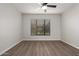 Bedroom with a ceiling fan and a large window allowing natural light at 20660 N 40Th St # 1112, Phoenix, AZ 85050