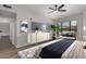 Cozy bedroom features a ceiling fan, natural light and a sitting area for relaxing after a long day at 20660 N 40Th St # 1112, Phoenix, AZ 85050