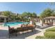 Stunning community pool area featuring a waterfall and comfortable seating at 20660 N 40Th St # 1112, Phoenix, AZ 85050