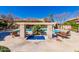 Community pool featuring spa, ample seating, stone columns, and lush landscaping at 20660 N 40Th St # 1112, Phoenix, AZ 85050